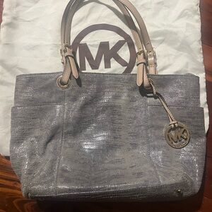 Michael Kors snakeskin shoulder bag.